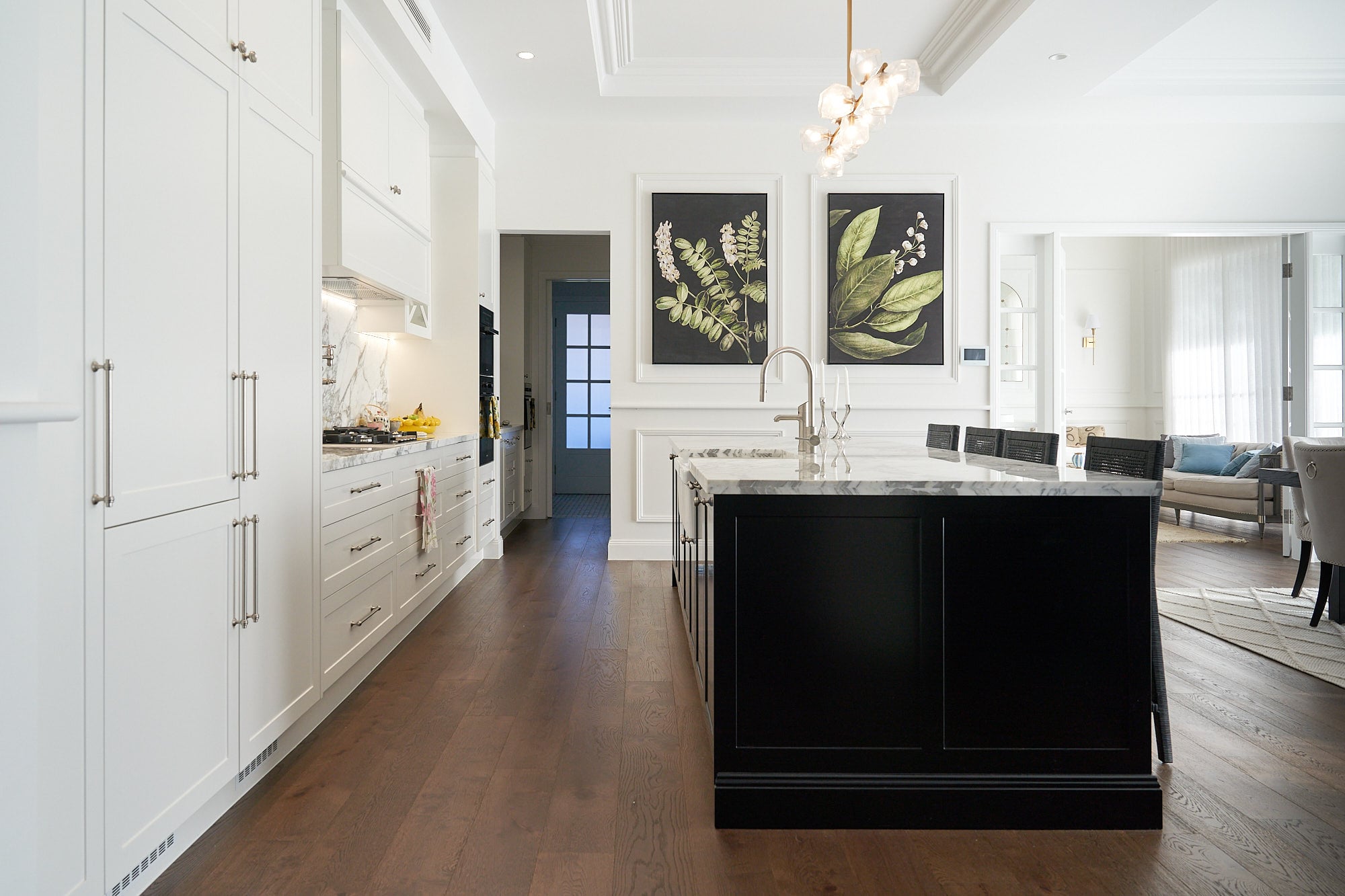 Black and white shaker kitchen with custom island by Renolux Sydney