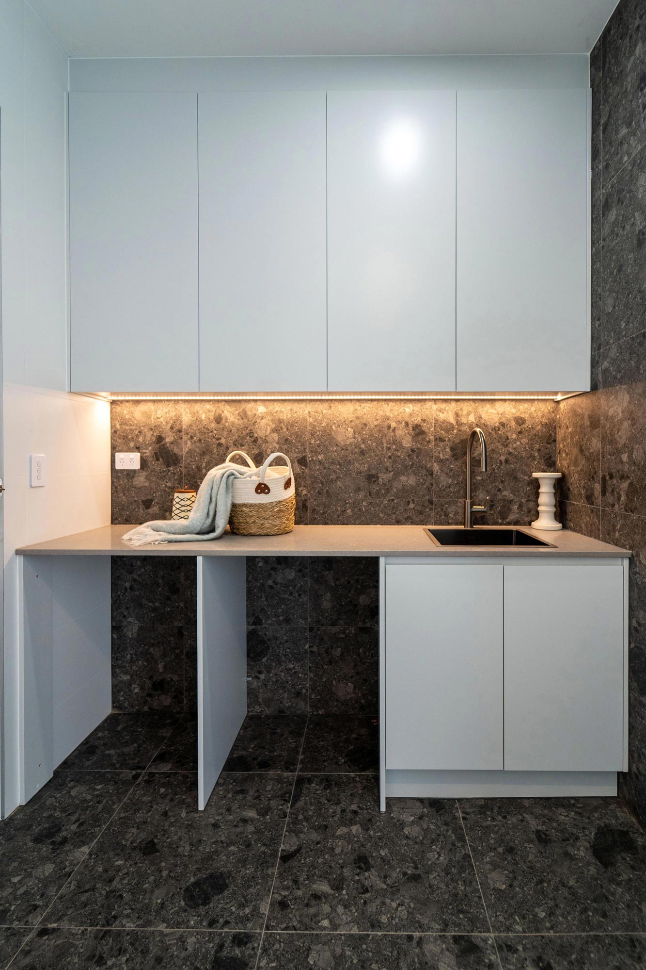 Flat white custom laundry cabinets by Renolux